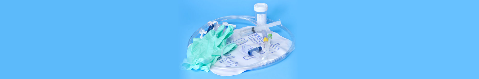 foley catheter and drainage bag with sterile gloves and specimen container